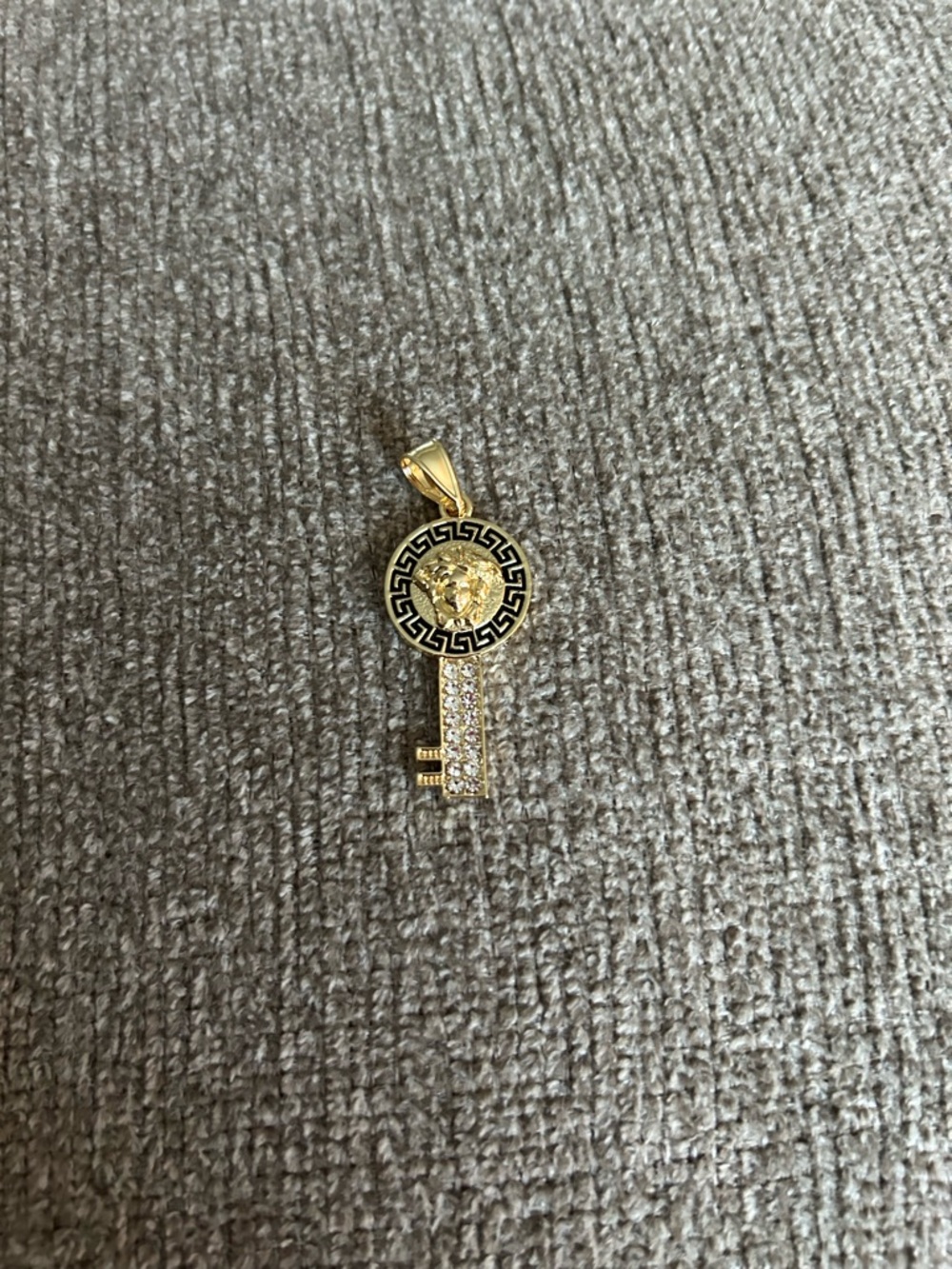 Gold Tone Key Pendant Necklace with Black Greek Pattern and Medusa Motif